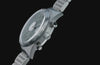 Marlin® Jet Chronograph with a green dial, white subdials, silver-tone stainless-steel bracelet, and side-mounted pushers against a black background.