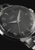 Timex Marlin Quartz with a polished stainless steel case, stainless steel bracelet, black sunray dial, luminous hands, and vintage-inspired design through rotating product views and close-up details.