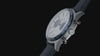 Timex Marlin® Jet Chronograph with a silver-tone dial, blue subdials, and blue fabric strap from multiple angles.