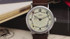 Video showcasing Harry Potter x Timex Weekender Hufflepuff House watch highlighting dial artwork, leather strap, and yellow INDIGLO feature.