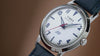 Marlin America 250 watch video highlighting the white dial, blue accents, red seconds hand, stainless-steel case, and blue leather strap inspired by American heritage.
